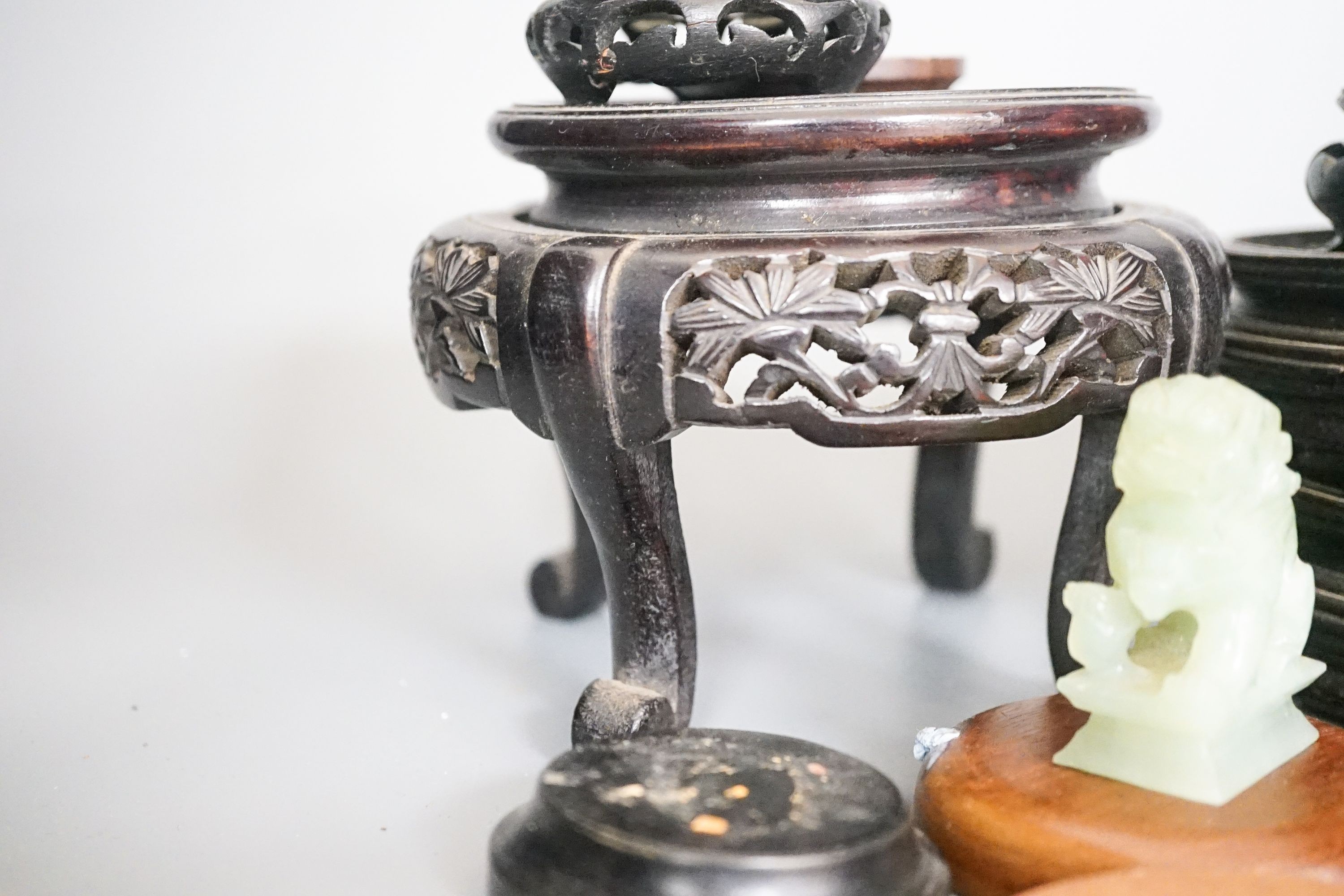 A group of Chinese wooden stands and stone carvings etc